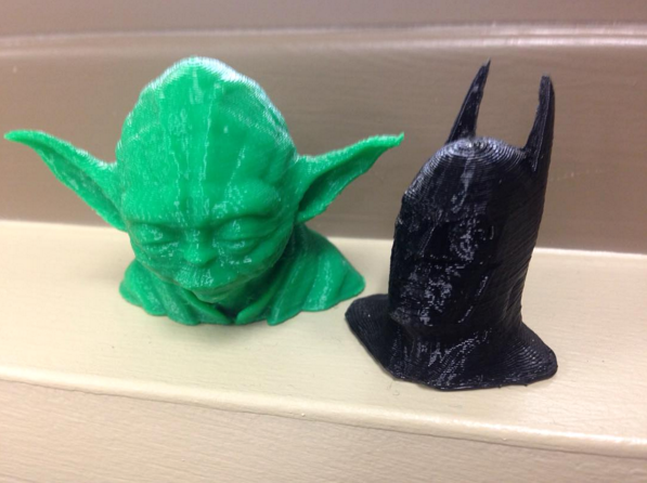 3D printed heads of Yoda and Darth Vadar