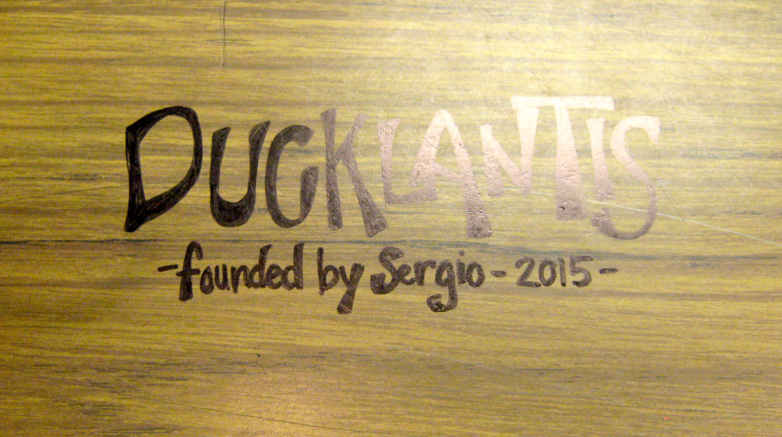 desk with word Ducklantis written on it