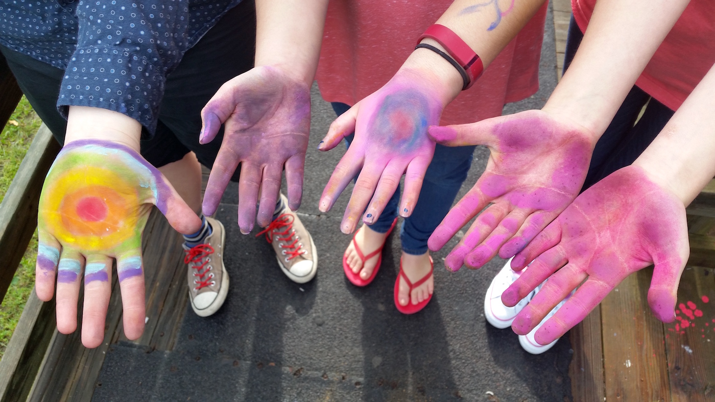 students' colored hands
