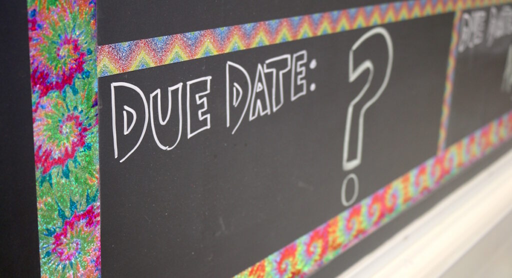 chalkboard with "due date" written on it