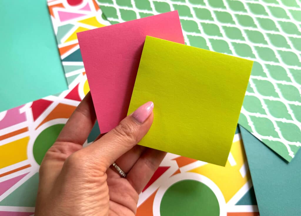 hand holding sticky notes