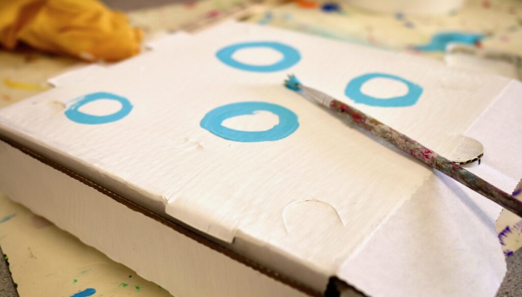 painted pizza box