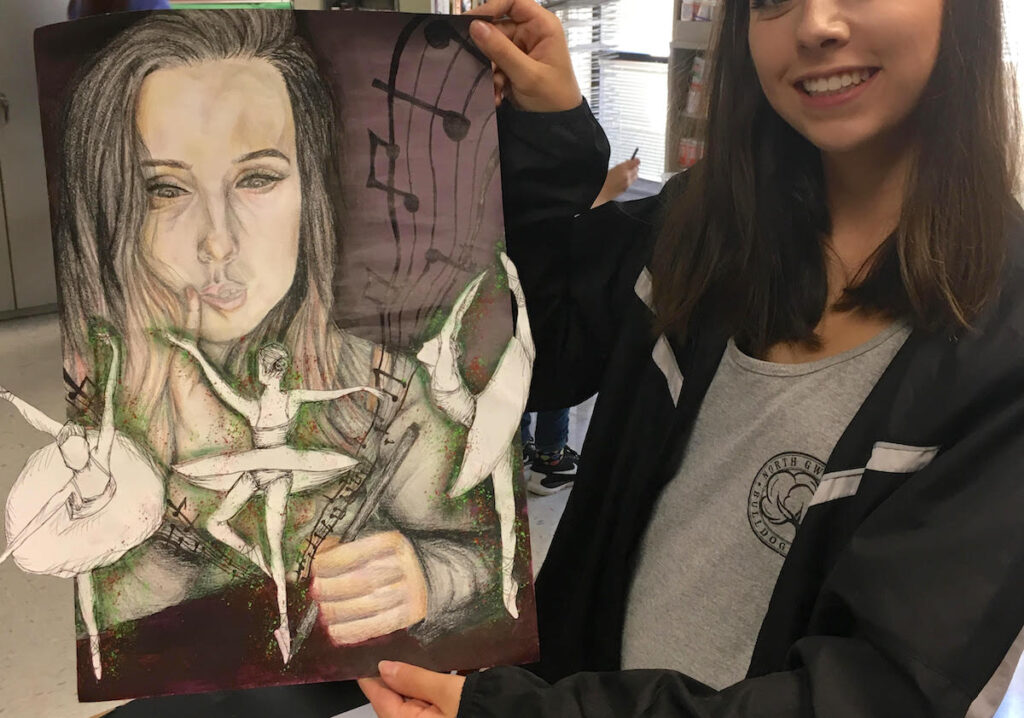student with finished piece