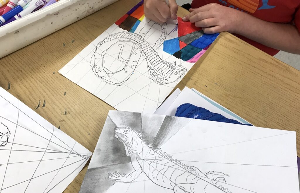 student working on modified drawing