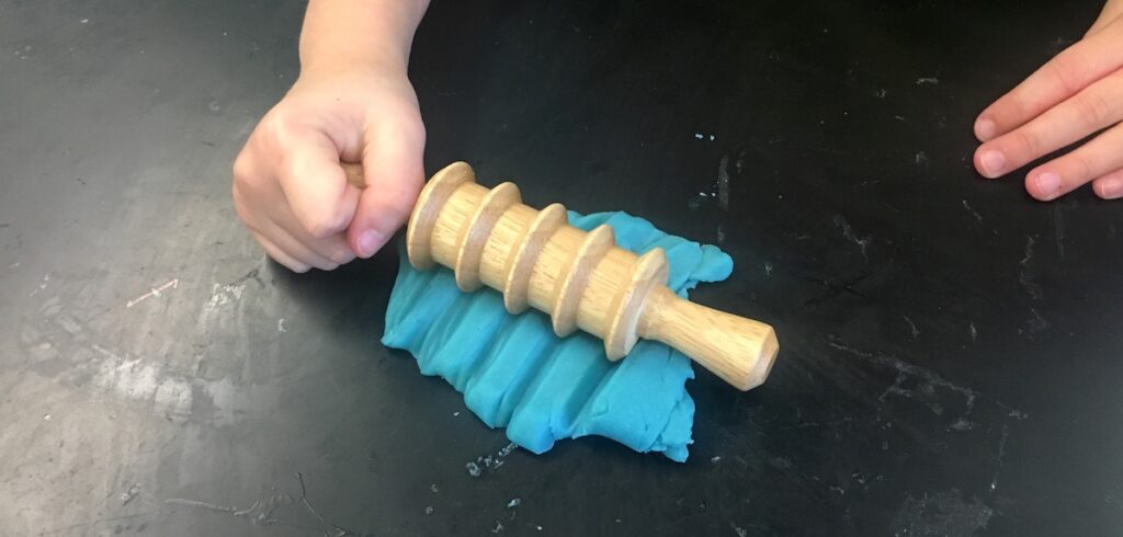 student using play doh instead of clay