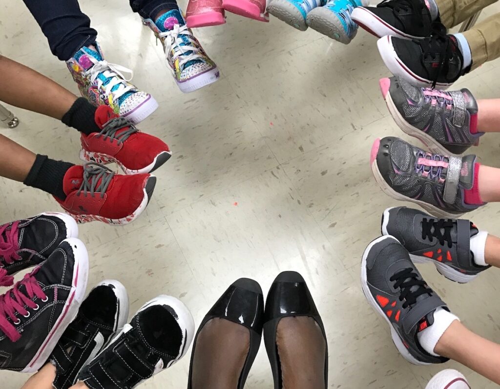 students feet in a circle