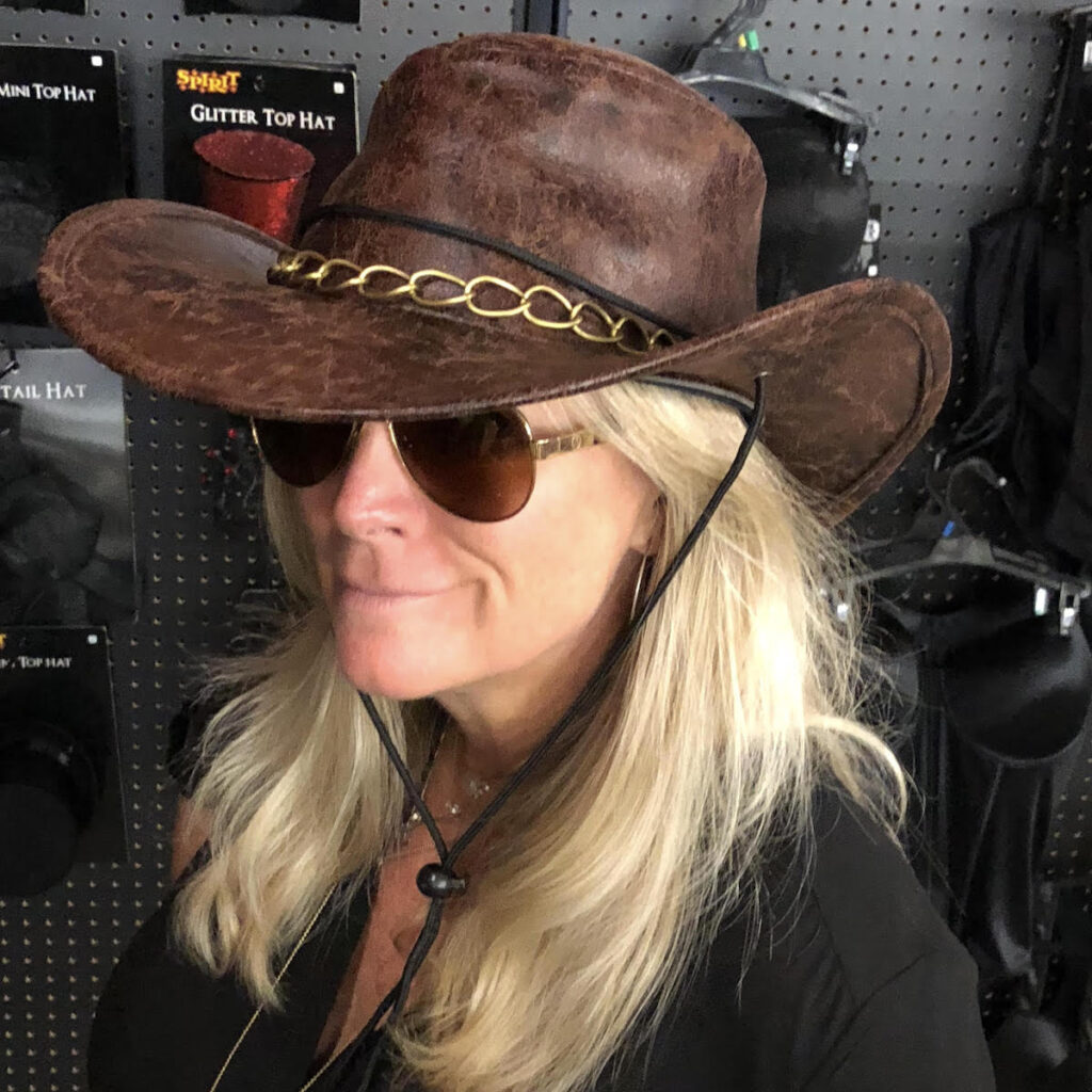 Debi wearing a cowboy hat