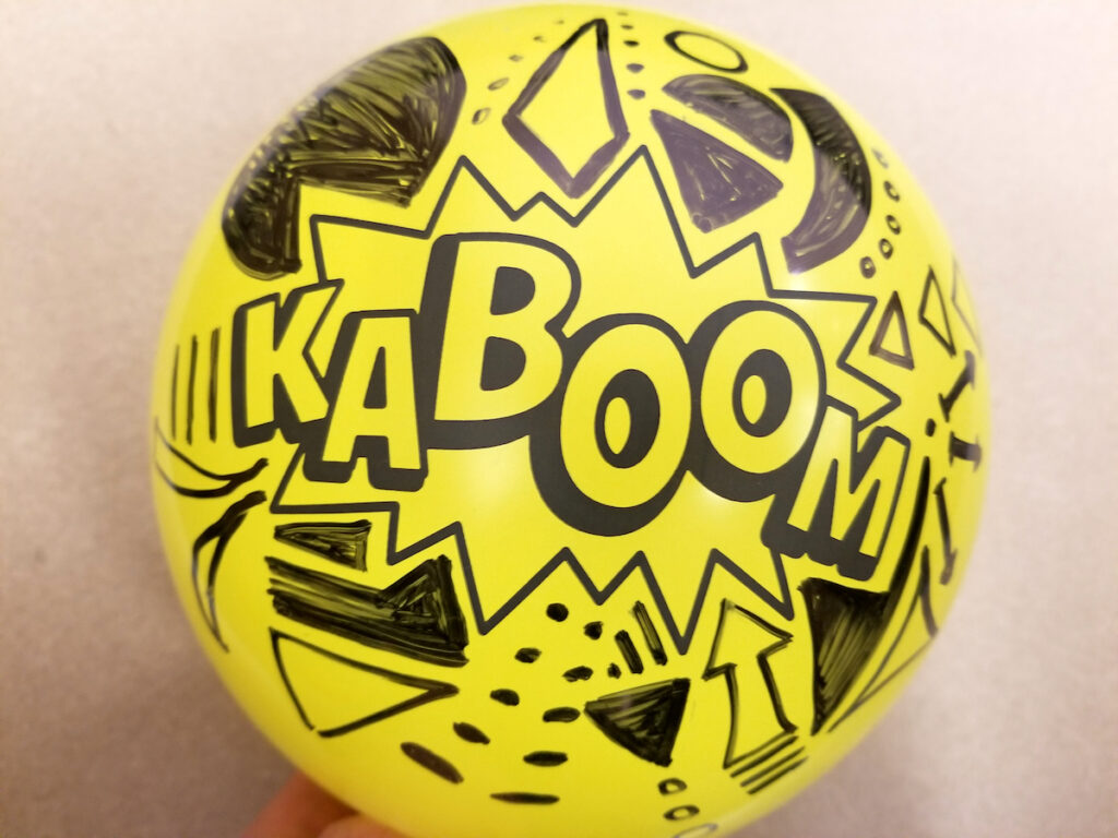 Balloon with Kaboom Written On It