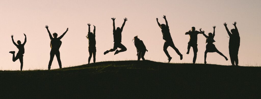 kids jumping in silhouette