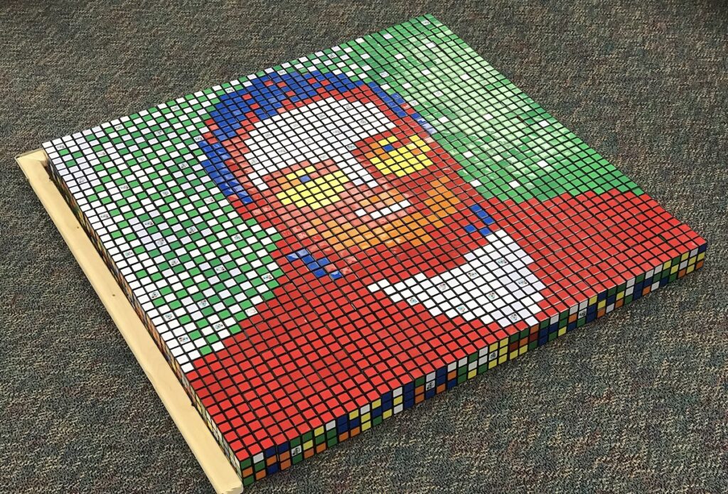 Completed Rubik's Cube Portrait of Person