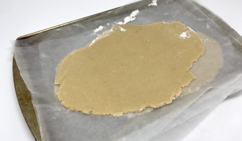 Image of cookie dough rolled out ready for cutting