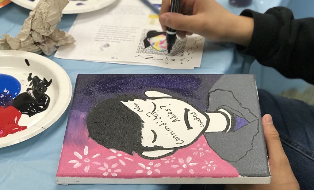Image of student working on Self portrait