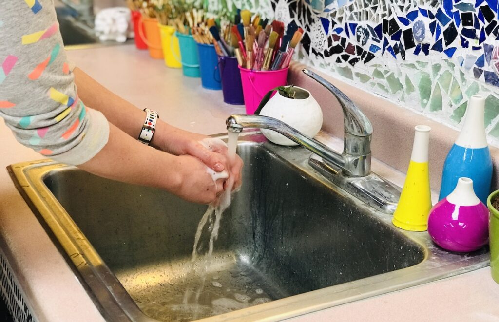 Artist washing hands