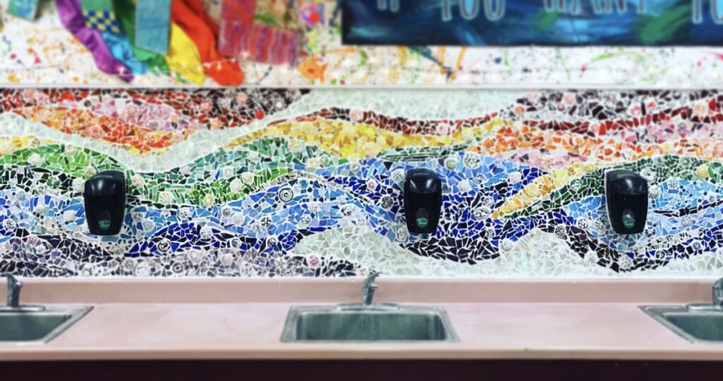 mosaic artwork over artroom sinks