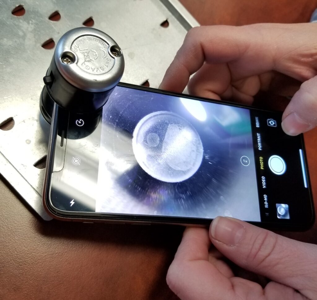 Taking photo of a microscope