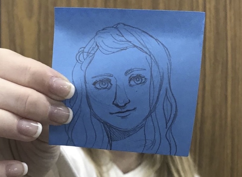 portrait drawn on blue paper