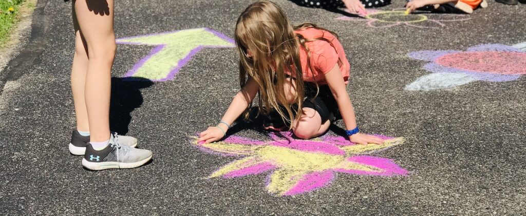 Student Drawing with Chalk