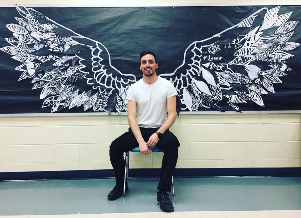 man with wings made with student artwork