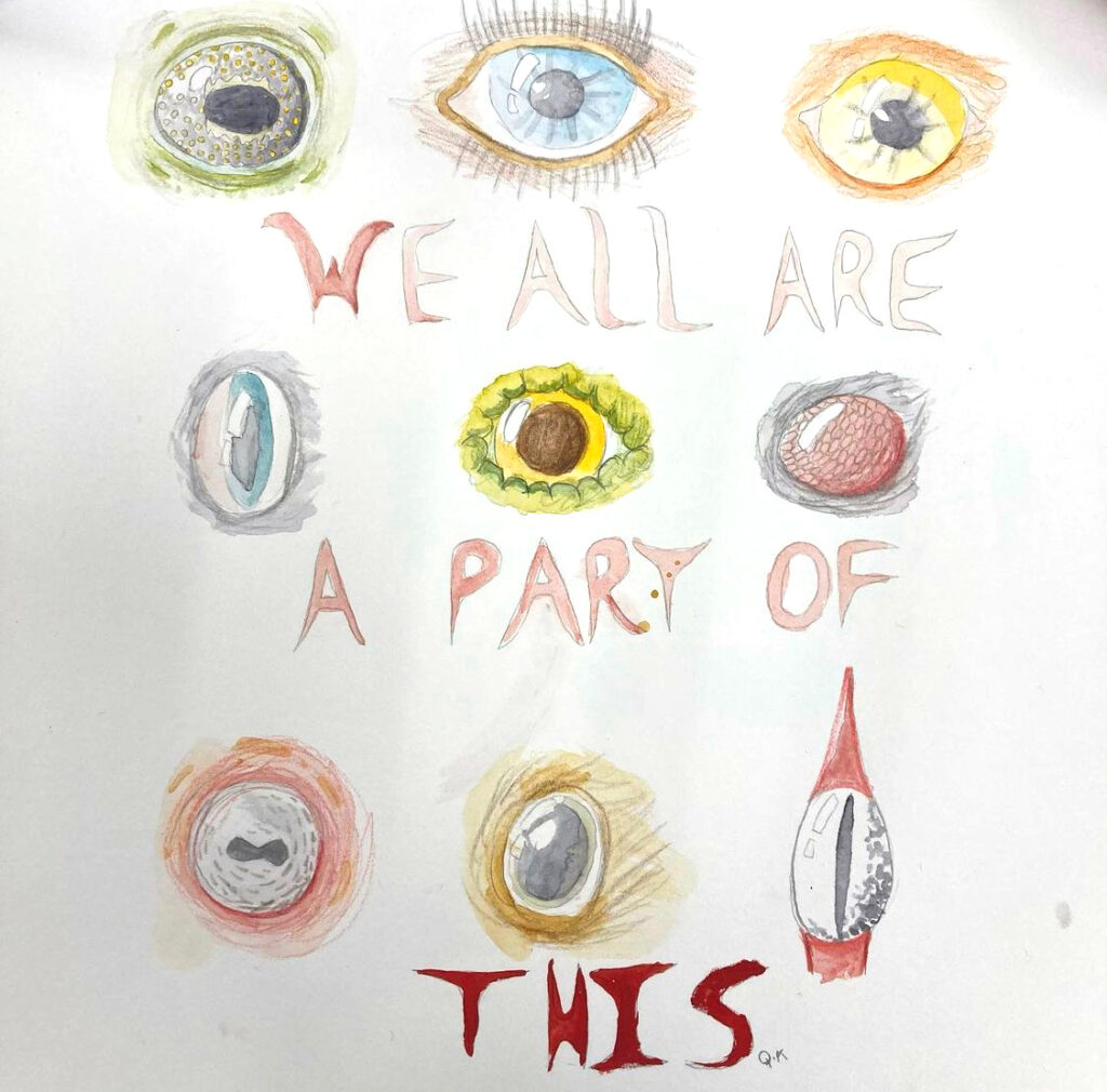 student artwork of eyes with quote we are all a part of this