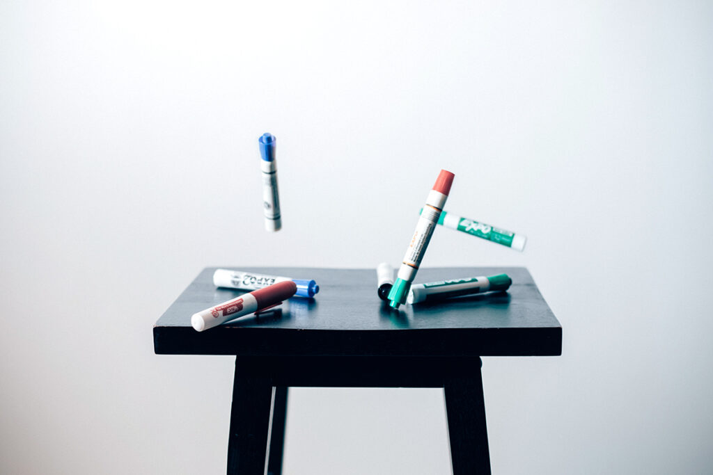 dry erase markers on stool