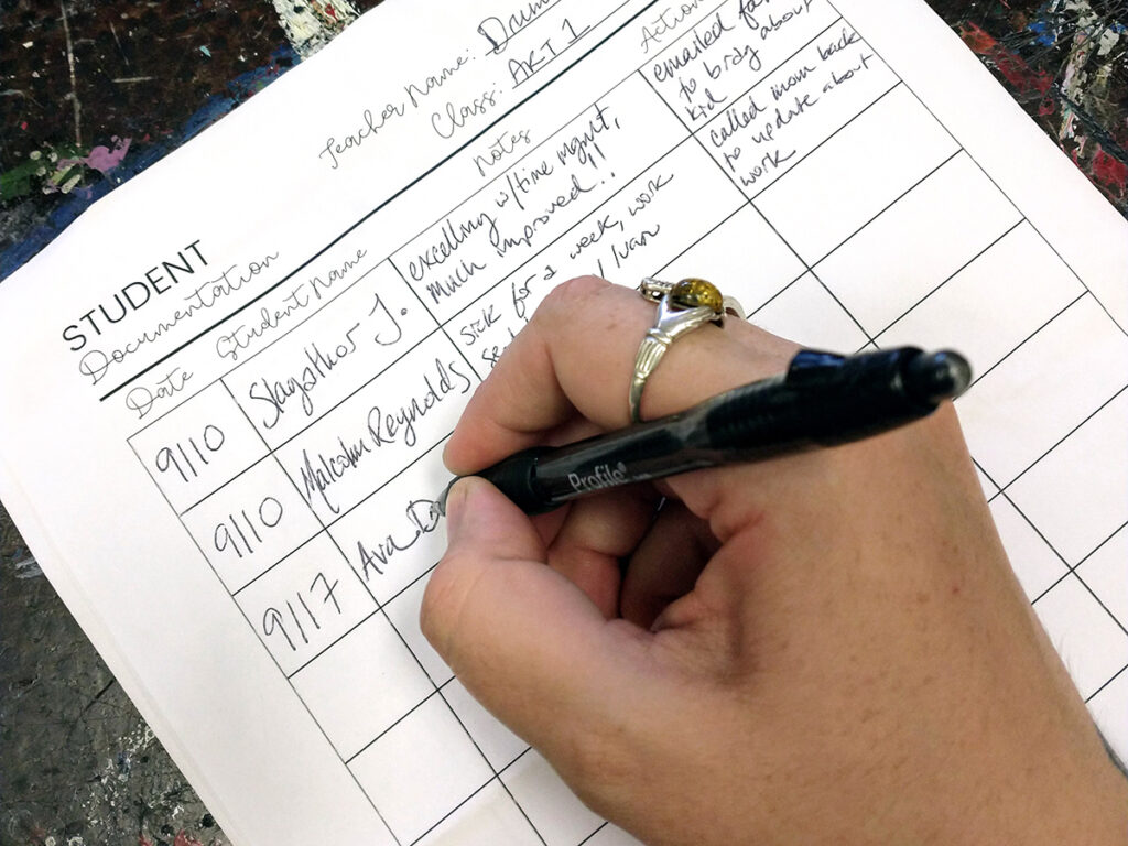 filling out paper log