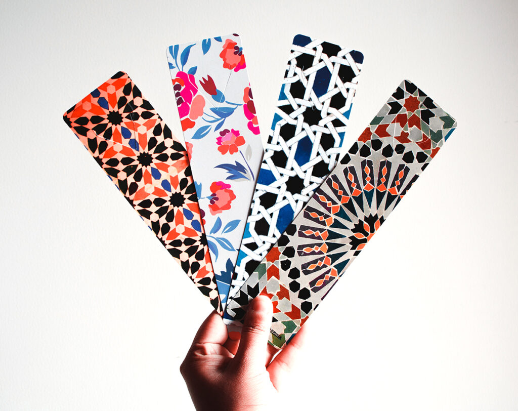 hand holding patterned bookmarks