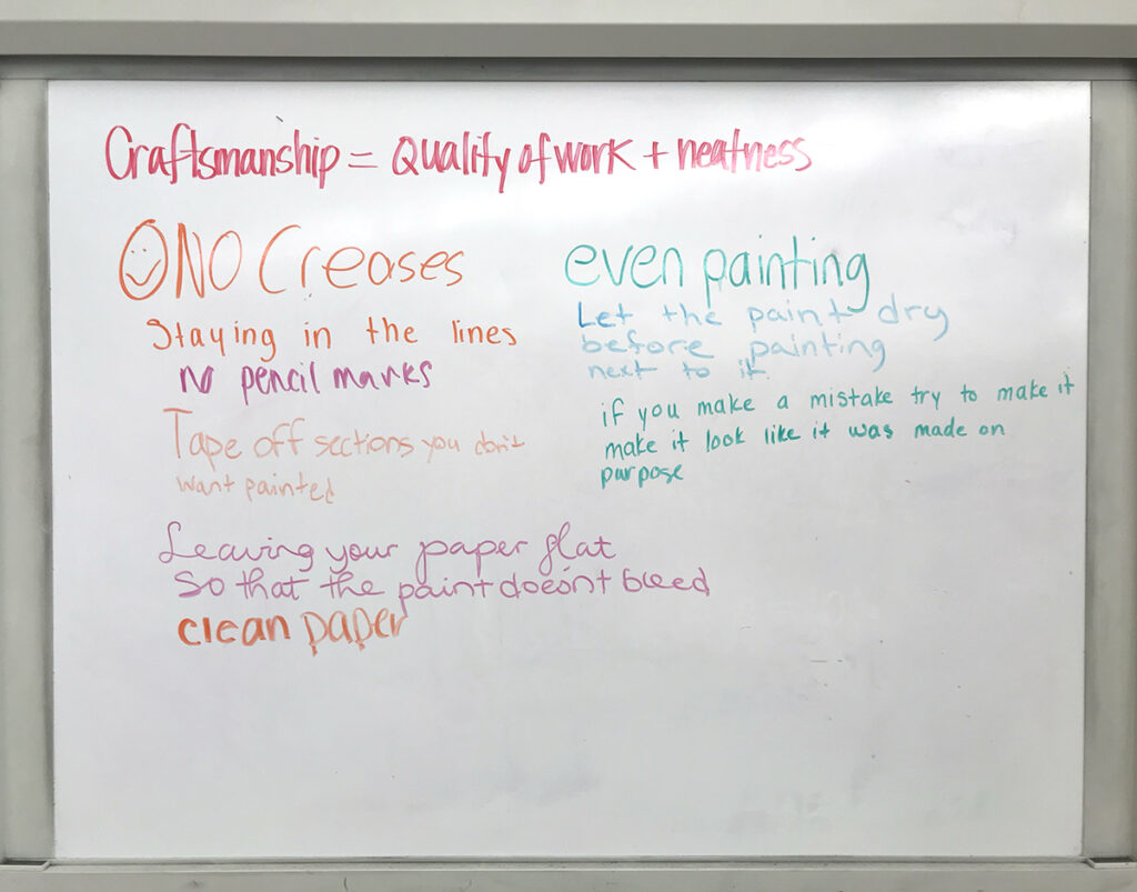 whiteboard with grading criteria