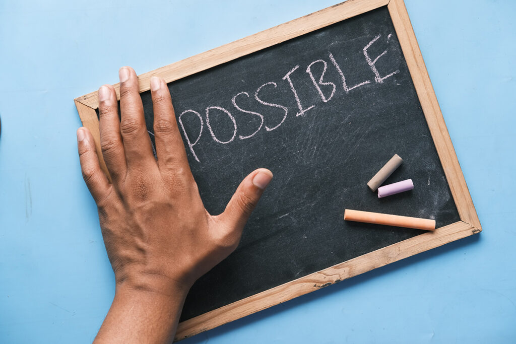 chalkboard that says possible