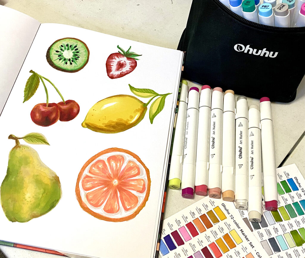 marker drawing of fruit in sketchbook