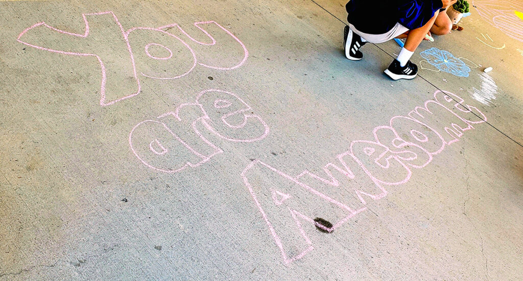 encouraging note sidewalk chalk