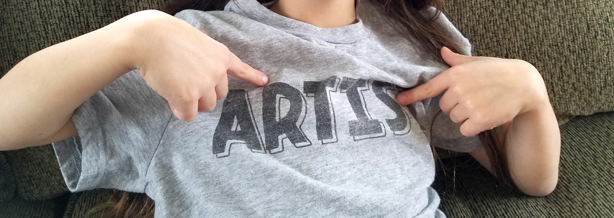 kid wearing "artist t-shirt