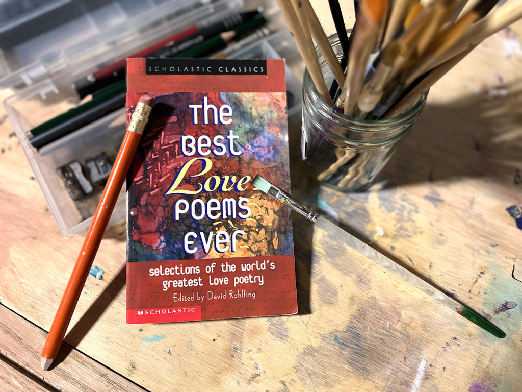love poetry book and art supplies