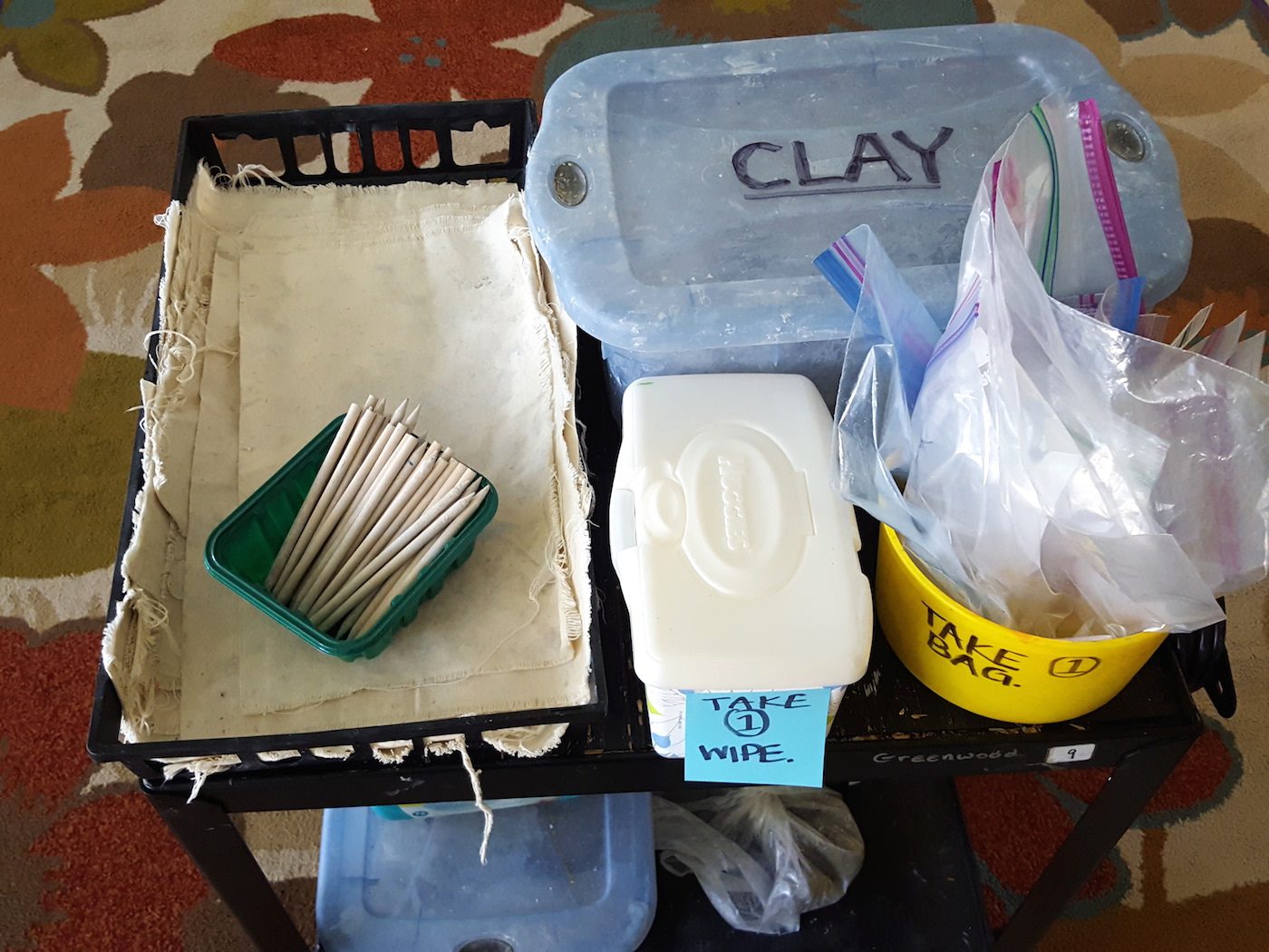 clay cart with supplies
