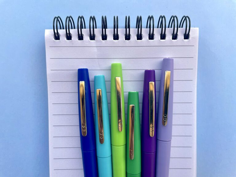 notepad and pens