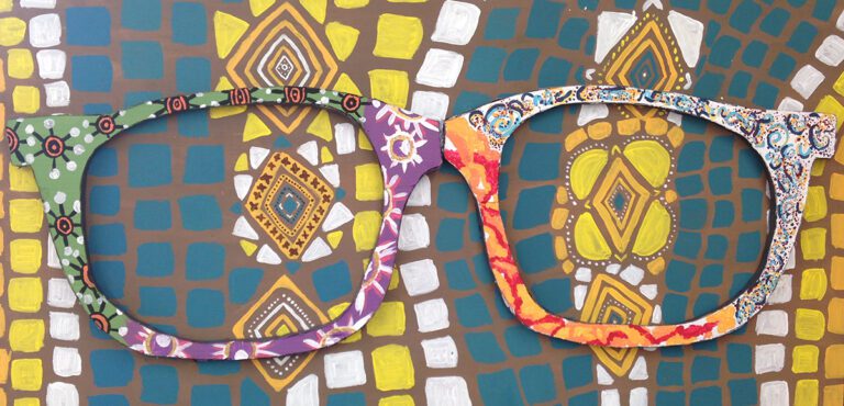 relief artwork african pattern and glasses