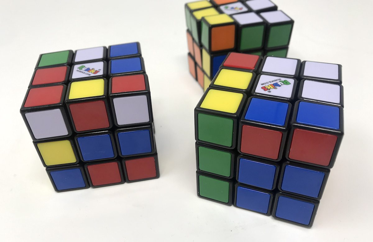 Three Unsolved Rubik's Cubes
