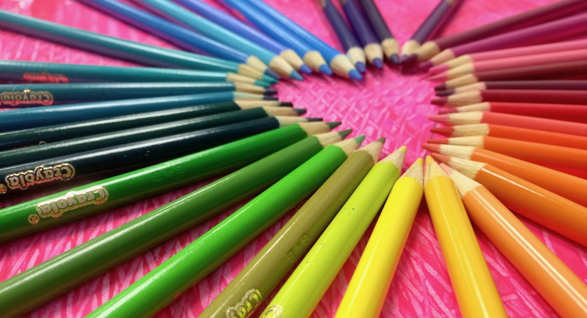 colored pencils in a heart