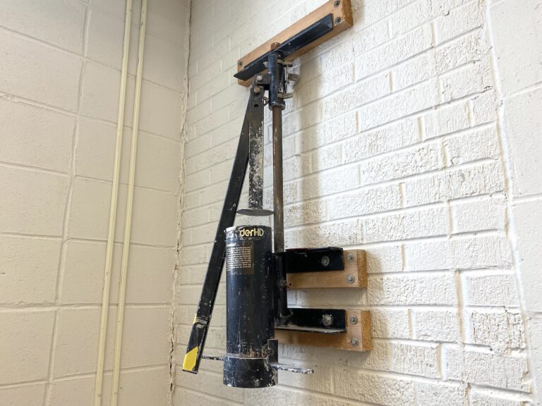 clay extruder mounted on a wall