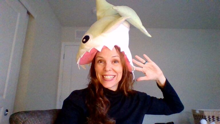 woman with shark on her head