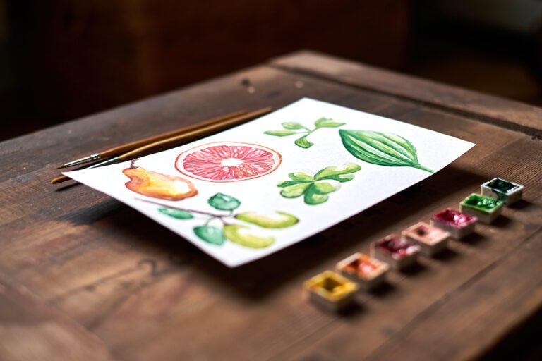 watercolor set with watercolor painting of summer fruit