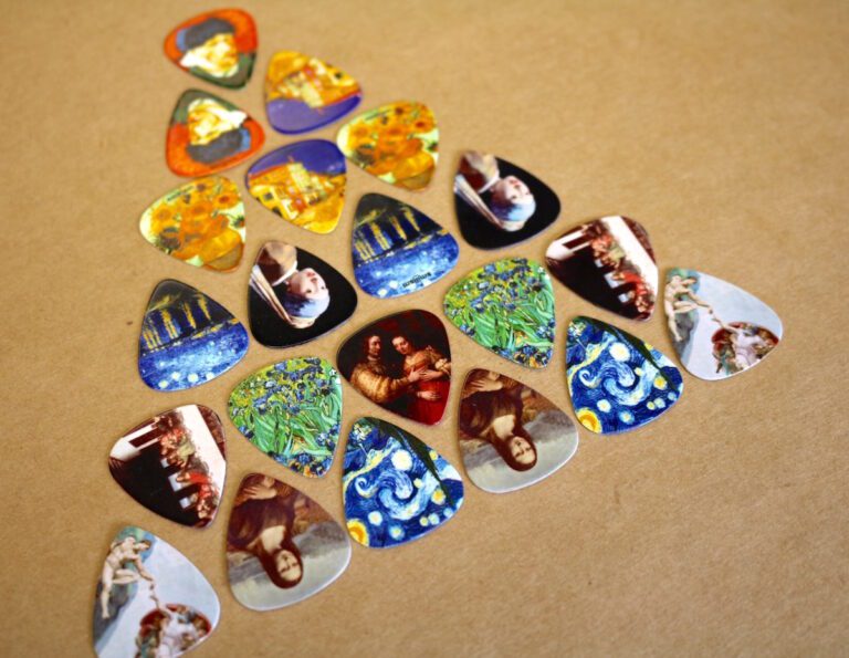 guitar picks organized in triangle