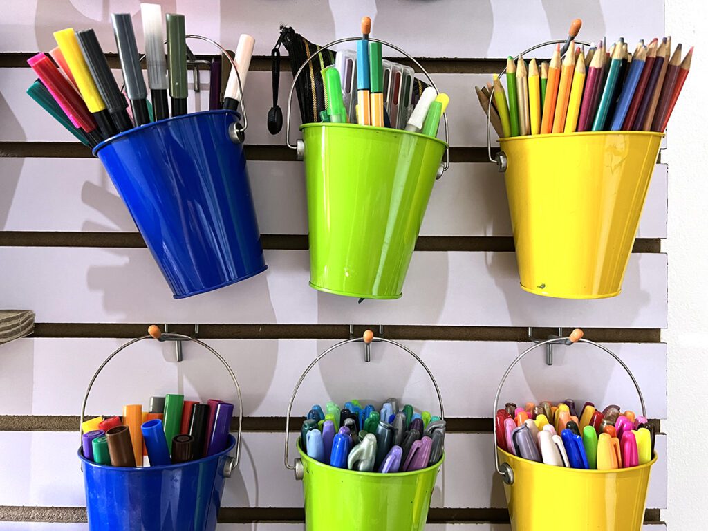 buckets of drawing supplies