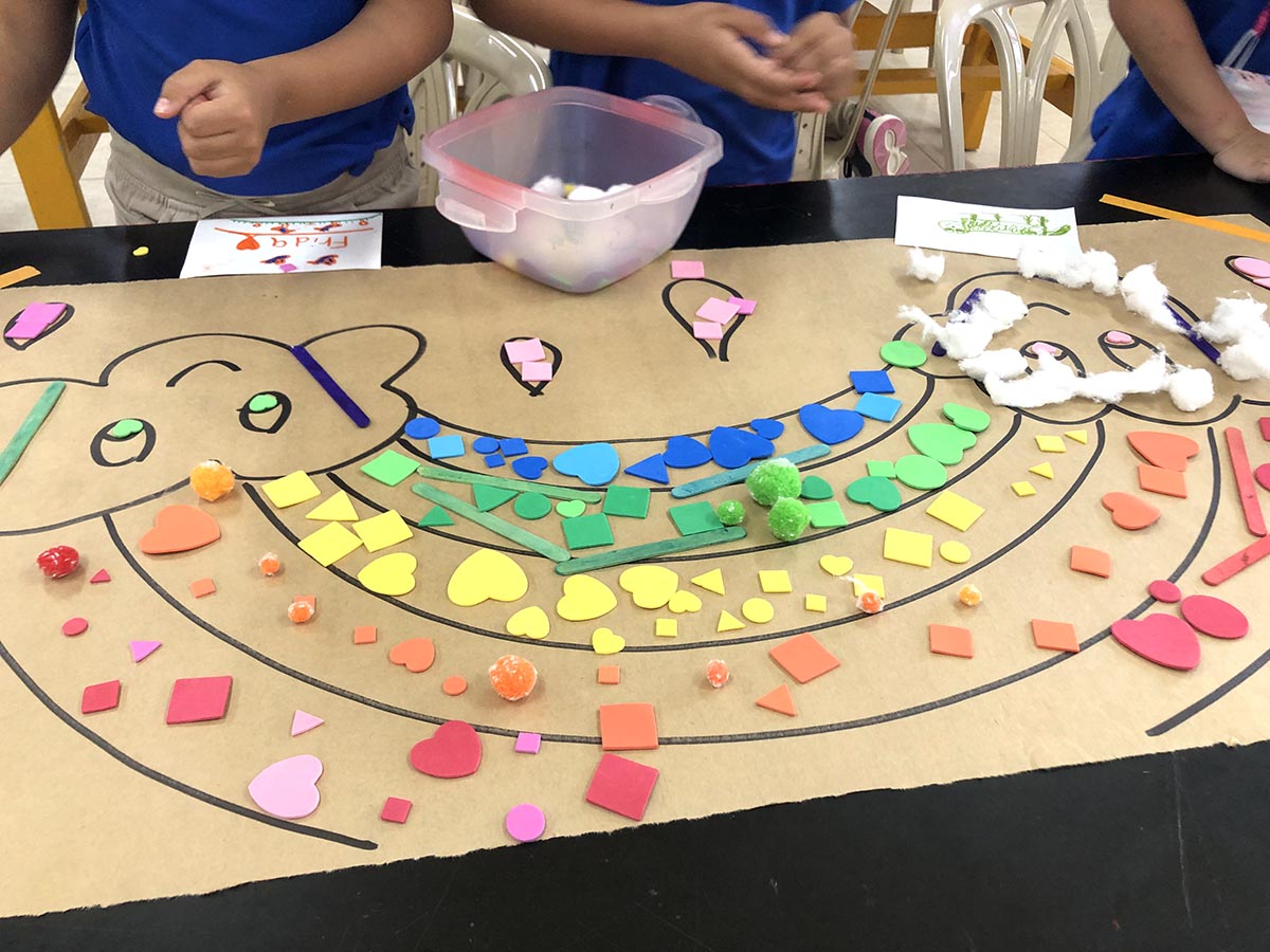 students making a rainbow together