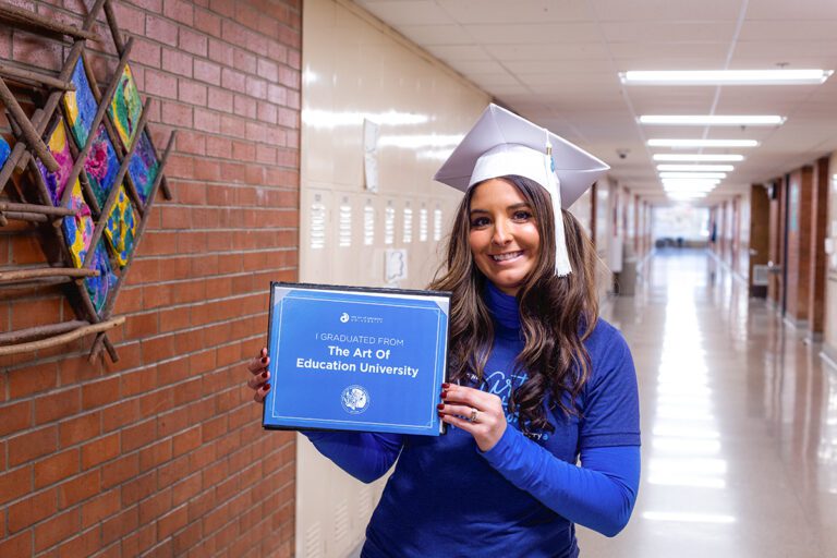 graduate student with diploma