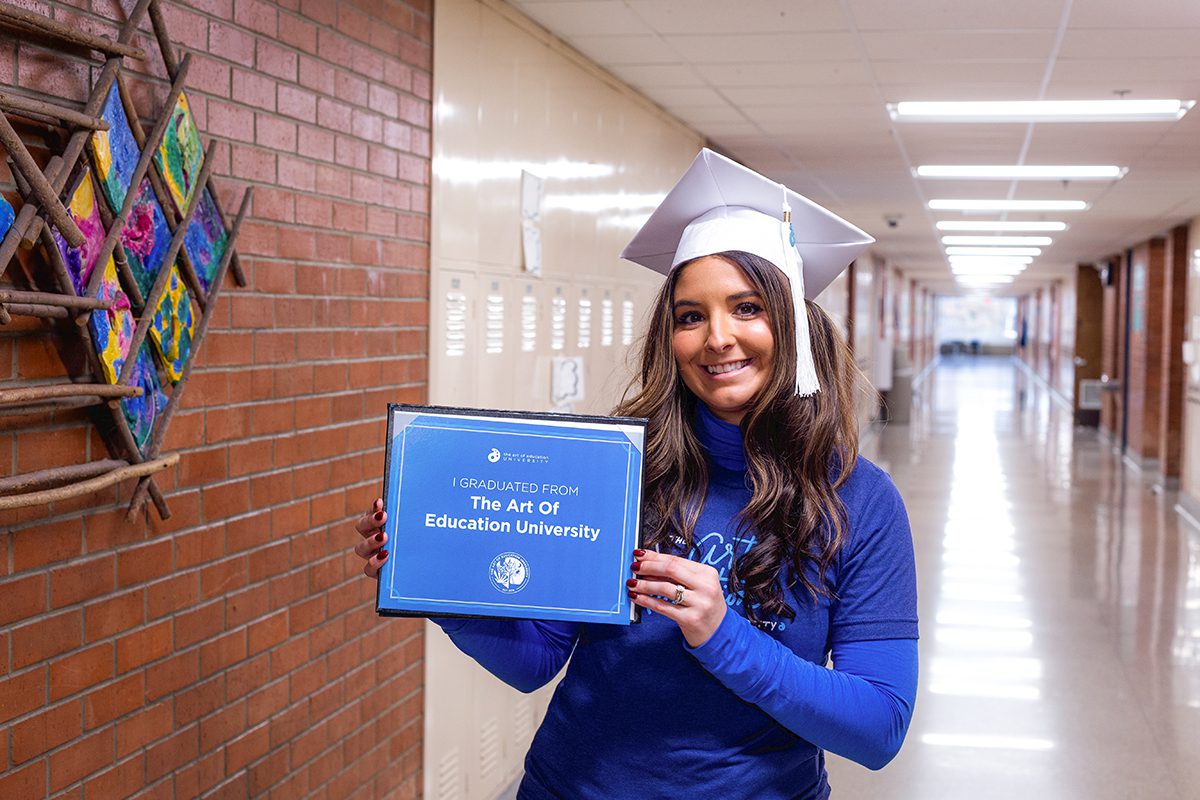 graduate student with diploma