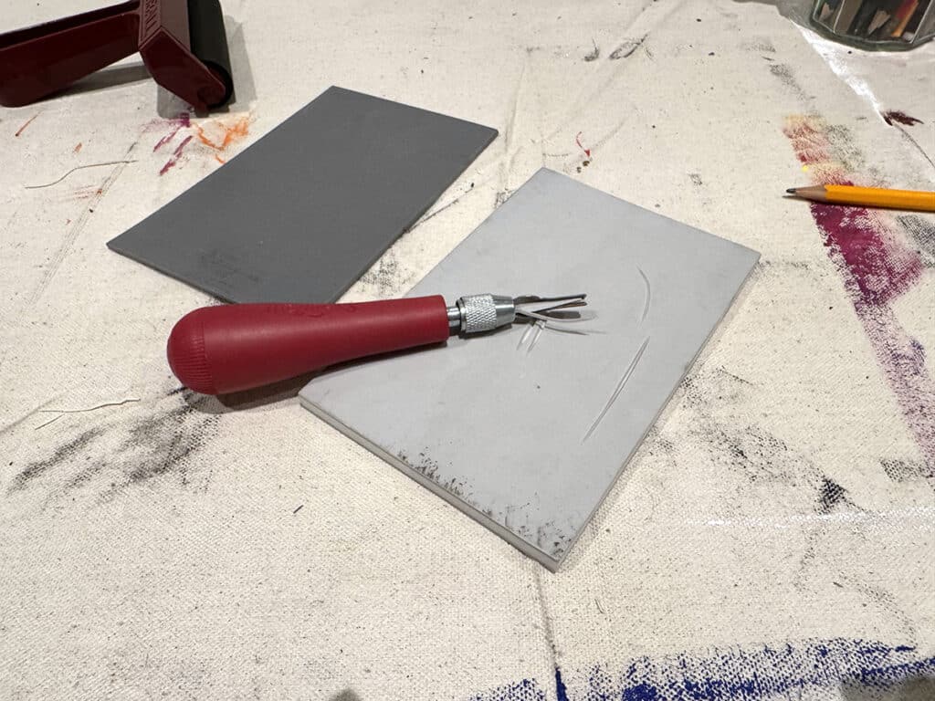 linocut plate and carving tool