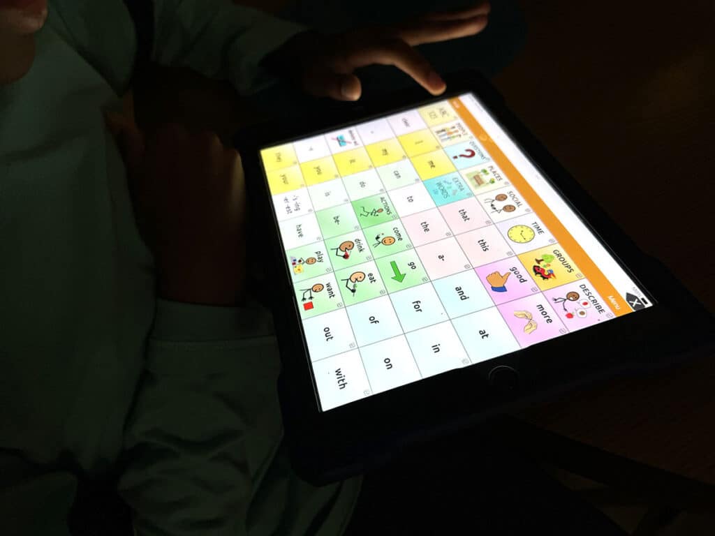 tablet with visual cue tiles that are words and pictures