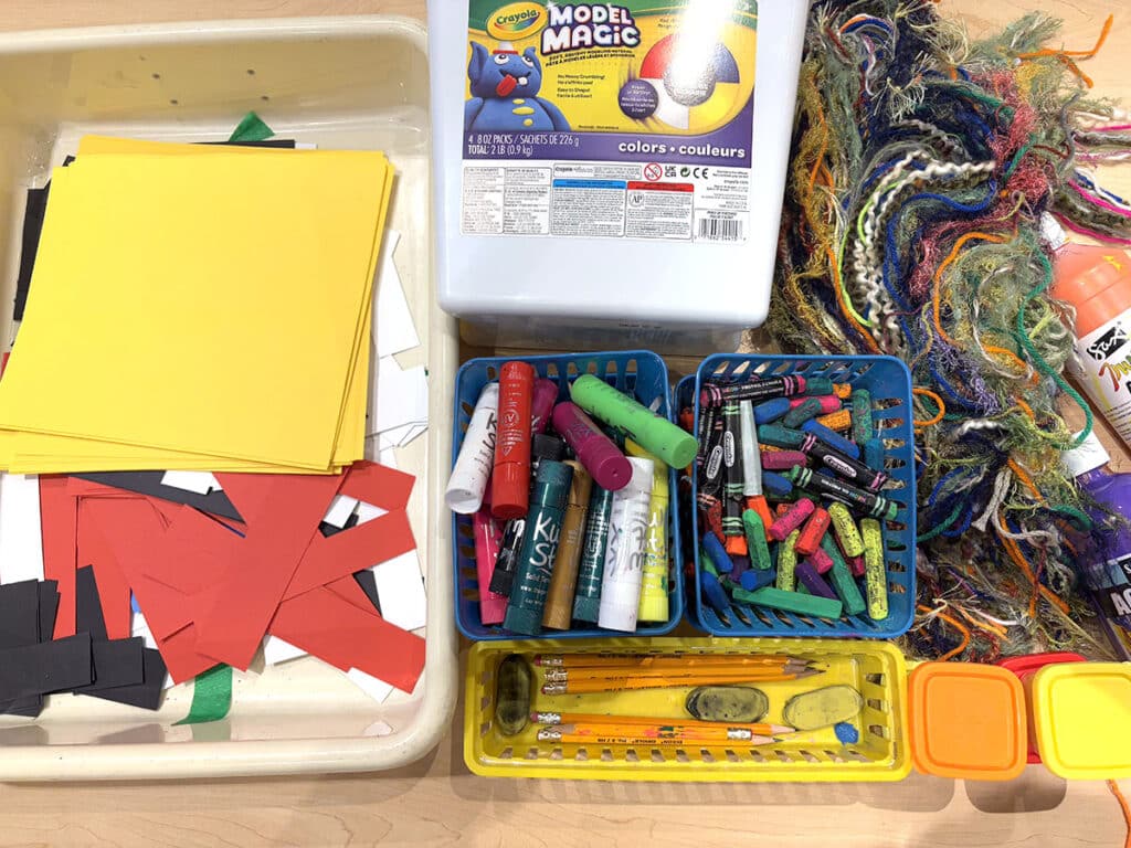 piles of art supplies