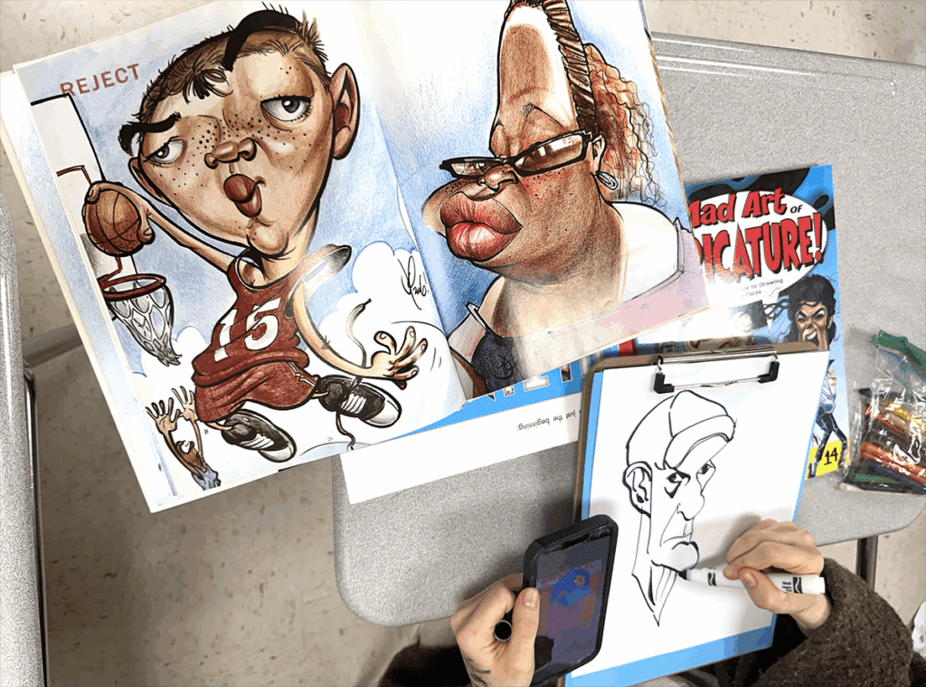 student drawing with caricature resources
