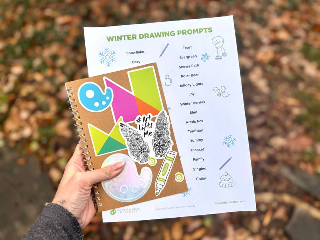 sketchbook with winter drawing prompts download
